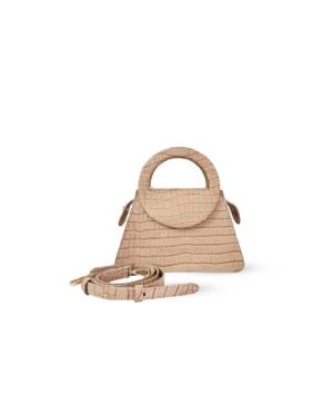 Cartera Aura nude en cuero croco con asa circular y correa desmontable – diseño artesanal hecho en Perú